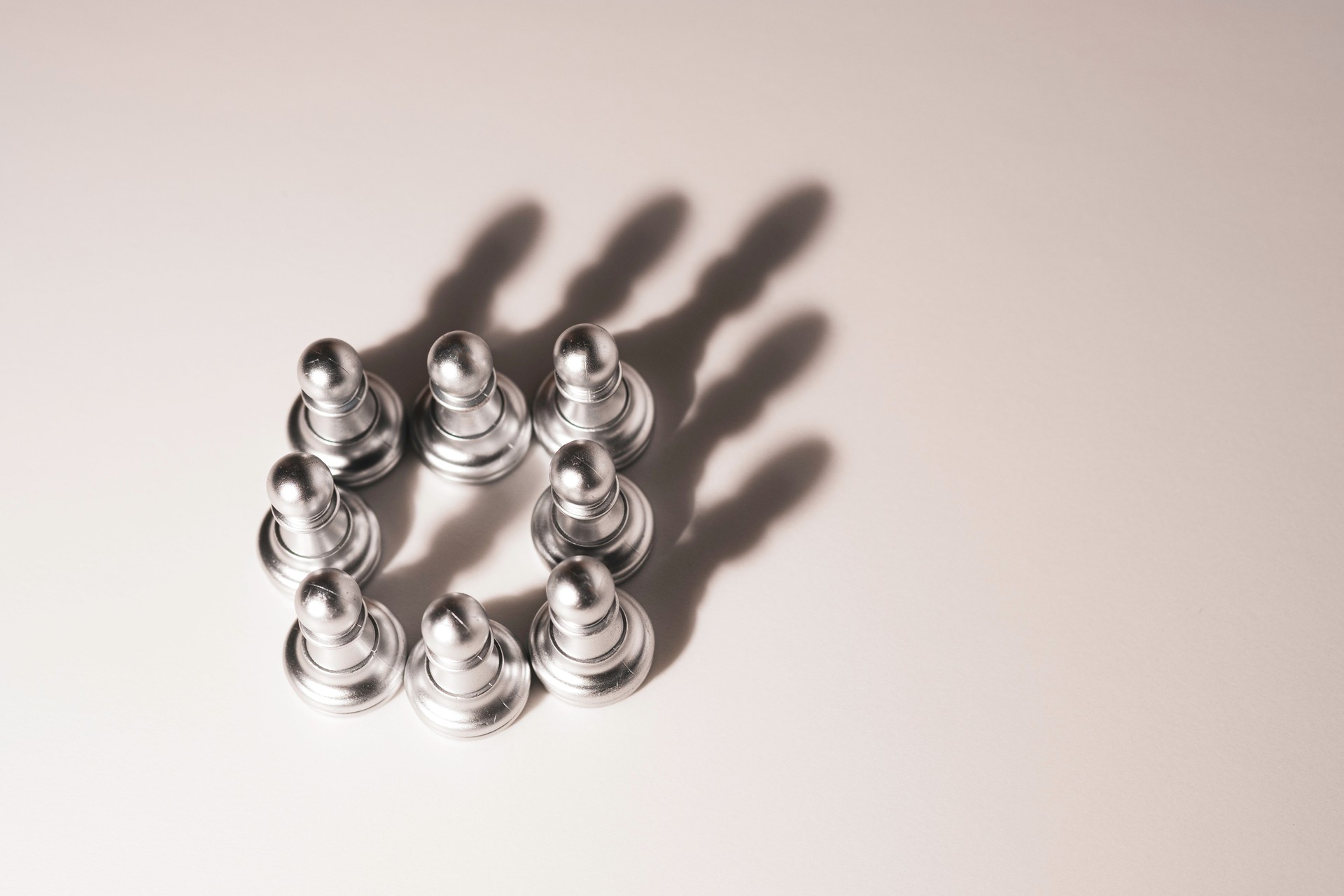 Light growing to pawn chess with generate shadow like corona or crown. Confident with leadership and teamwork concept.